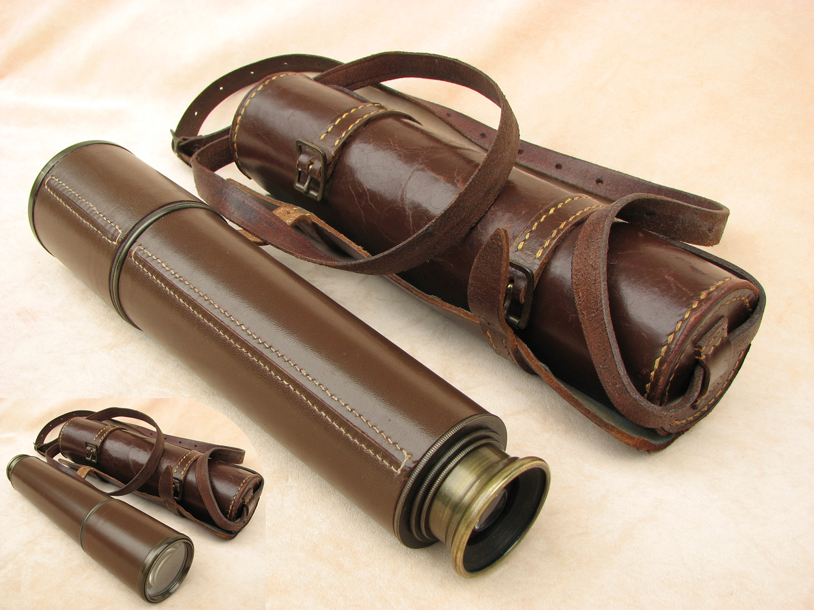 Broadhurst Clarkson 3 draw field telescope in leather wrap case.